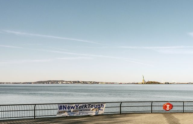 A photo of A view of the Statue of Liberty from Battery Park. Taken on May 2, 2020 at 7:56:00 AM
